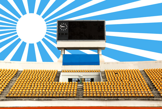 Stadium with scoreboard and sun ray photo
