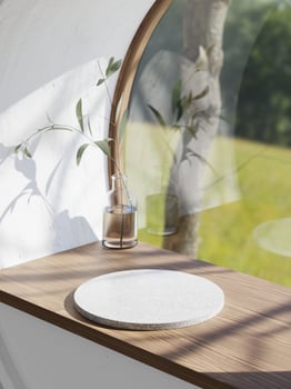 3d white granite display podium on wooden table against the window. 3d rendering of realistic presentation for product advertising. 3d interior illustration. photo