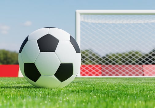 3d black and white soccer ball on green grass pitch against soccer goal. 3d rendering of sport equipment. 3d illustration. photo