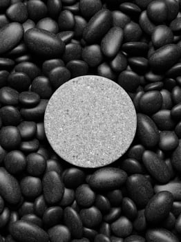 3d round display podium on the pebbles. 3d rendering of realistic presentation for product advertising. 3d minimal illustration. photo