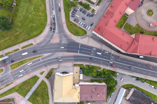 aerial view of huge road junction of freeway with heavy traffic at city photo