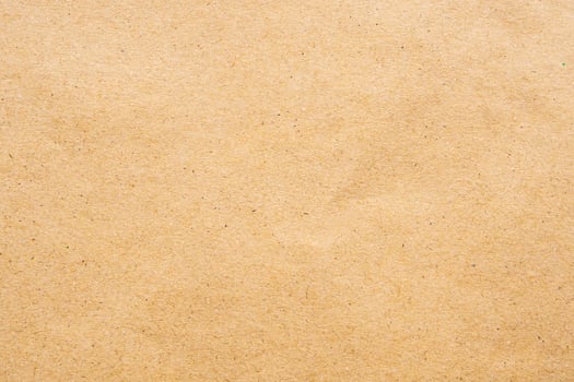 Brown eco recycled kraft paper sheet texture cardboard background photo
