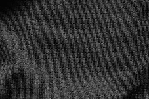 Black sport cloth fabric football shirt jersey texture close up photo