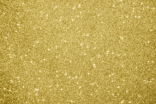 Abstract gold glitter sparkle background photo