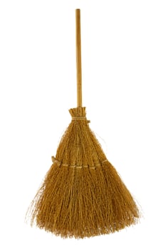 Old-fashioned vintage broomstick with wooden handle on white isolated background. Symbol of clean, Halloween, witches. Copy space photo