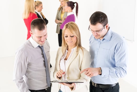 Business people discussing photo