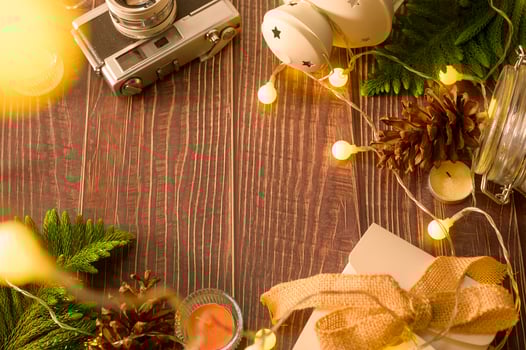 Christmas lights bokeh in home on wooden table  decorations. Winter  Holiday decoration, Christmas and New year decorations concept photo