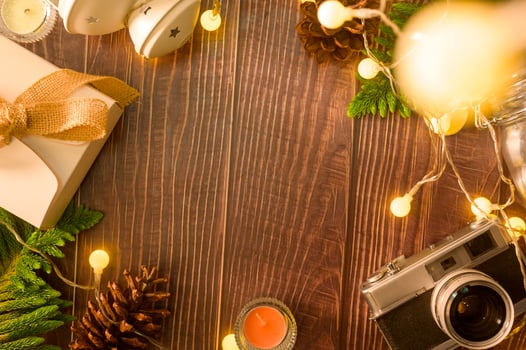 Christmas lights bokeh in home on wooden table  decorations. Winter  Holiday decoration, Christmas and New year decorations concept photo