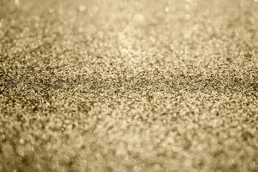 Abstract gold glitter sparkle texture background photo