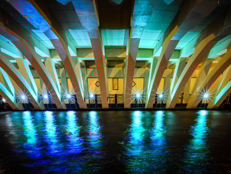 Night view of an illuminated concrete bridge in Melaka, Malaysia photo