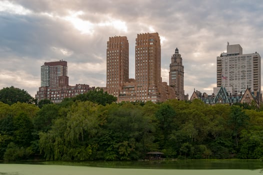 View of apartments overlooking the Conservatory Water in Central Park, New York City. photo
