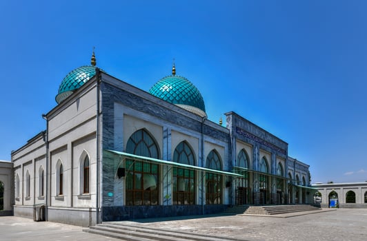 View of the medieval Dzhuma Mosque in Tashkent, Uzbekistan during a hot summer day. photo