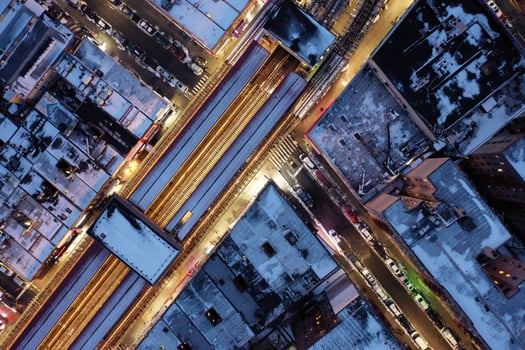 Aerial top-down view of elevated subway tracks in New York City on a winter day. photo