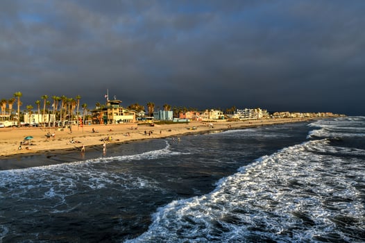 The pier and Pacific Ocean at sunset, in Imperial Beach, near San Diego, California photo