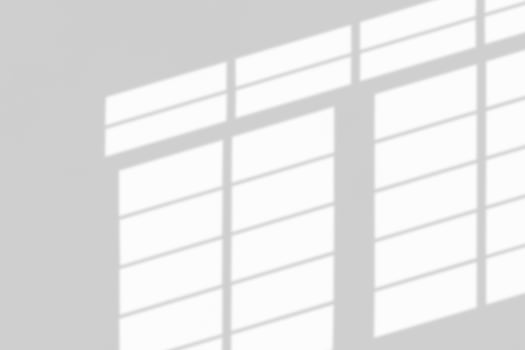 Window shadow drop on white wall background photo