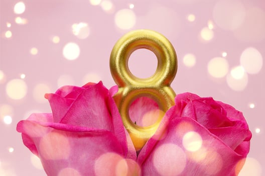 Bouquet of pink roses with number eight, bokeh. Holiday, March 8, International Women's Day. Copy space photo