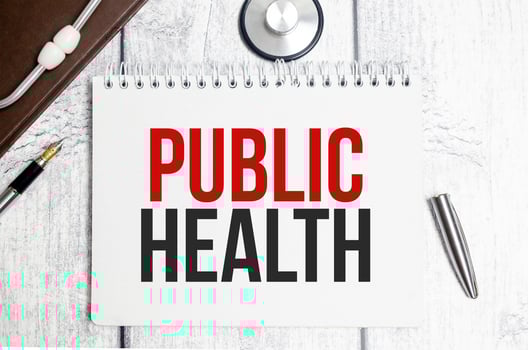 word public health with stethoscope on wooden background photo