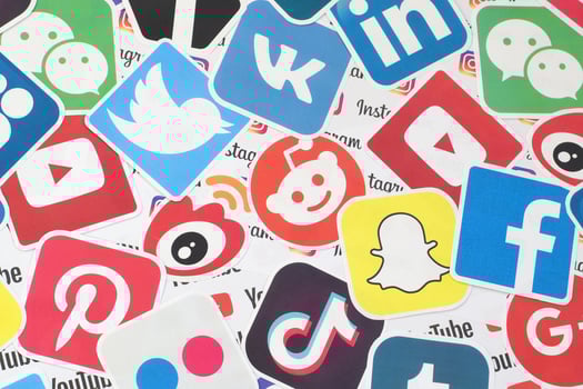 Many paper logos of popular social networks and internet resources. Colorful banner photo