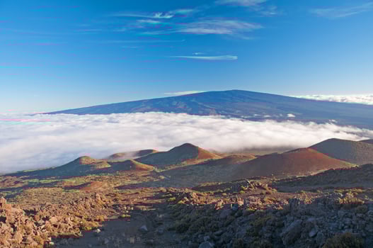 Clouds and clear skies from the Hawaiian Mountains photo