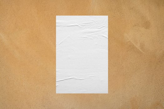 Blank white wheatpaste glued paper poster mockup on concrete wall background photo