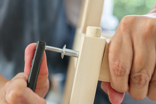 Assembly wooden furniture at home using screw allen photo