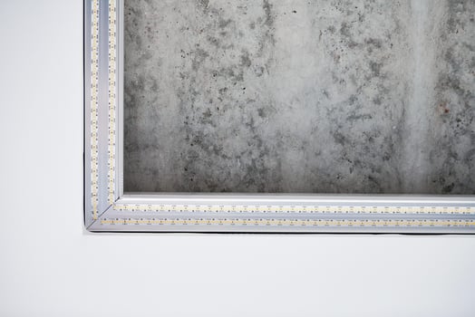 Strip LED light with square aluminum profile on stretch ceiling, close up. Home renovation concept photo