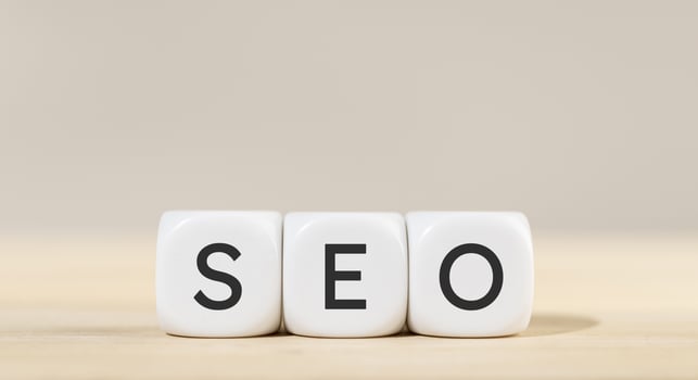 SEO word in white cube blocks. Search Engine Optimization concept photo