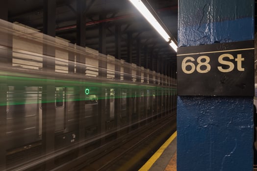 New York City - November 18, 2016 -  Six train running through Sixty Eighth Street Subway station on the East Side of Manhattan, New York City. photo