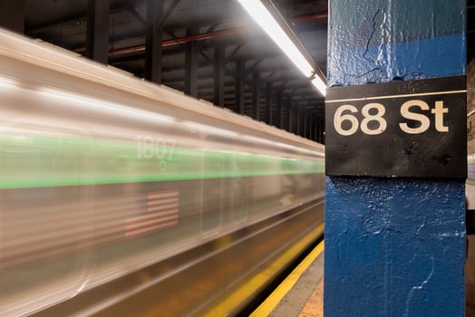 New York City - November 18, 2016 -  Six train running through Sixty Eighth Street Subway station on the East Side of Manhattan, New York City. photo