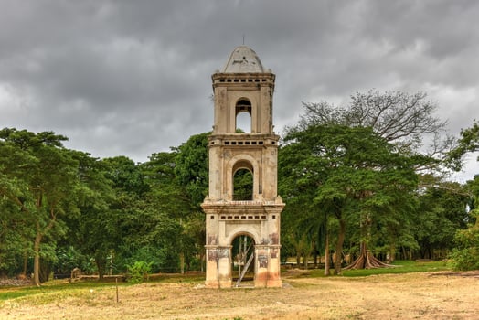 Ruins of the slave tower of the once grand sugar mill Ingenio San Isidro de Los Destiladeros in the Valle de los Ingenios, Trinidad, Cuba photo