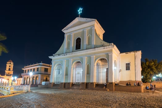 Holy Trinity Church in Trinidad, Cuba. The church has a Neoclassical facade and is visited by thousands of tourists every year. photo