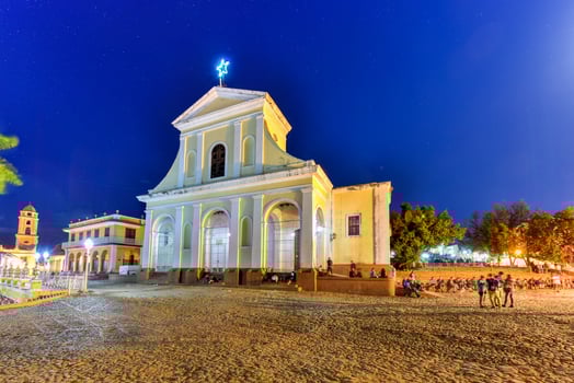 Holy Trinity Church in Trinidad, Cuba. The church has a Neoclassical facade and is visited by thousands of tourists every year. photo