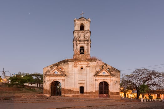 Ruins of the colonial catholic church of Santa Ana in Trinidad, Cuba at night. photo