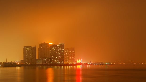 Williamsburg, Brooklyn view from Roosevelt island on a foggy night. photo