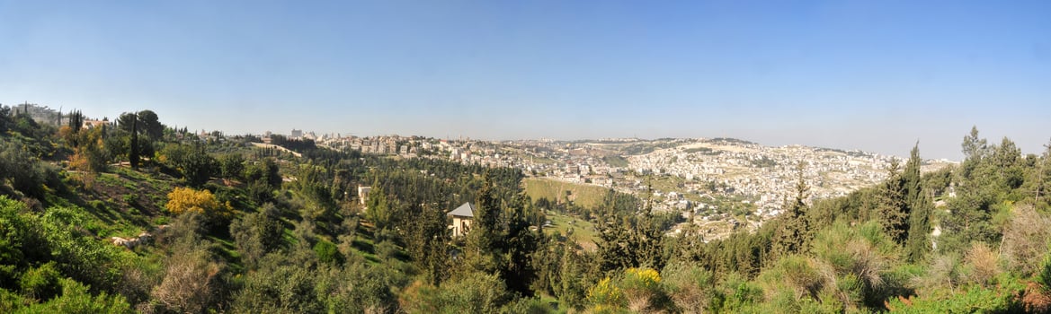 Panoramic view on white old Jerusalem. The Armon Hanatziv Promenade overlooks most of Jerusalem and offers a beautiful view of the city. photo