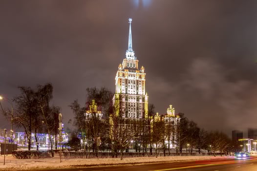 View of Hotel Ukraina at night in Moscow, Russia. It is one of the Seven Sisters, a group of seven skyscrapers in Moscow designed in the Stalinist style. photo
