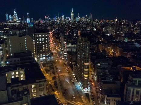 Aerial view of Midtown Manhattan from downtown in Manhattan, New York City at night. photo