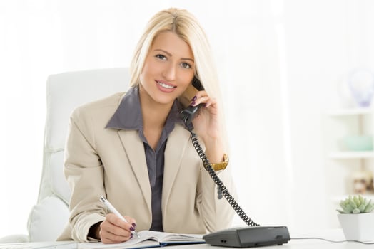 Businesswoman Phoning In The Office photo