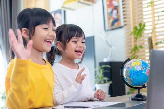 Asian girl student online learning class study online video call zoom teacher, Happy girl learn english language online with laptop at home.New normal.Covid-19 coronavirus.Social distancing.stay home photo