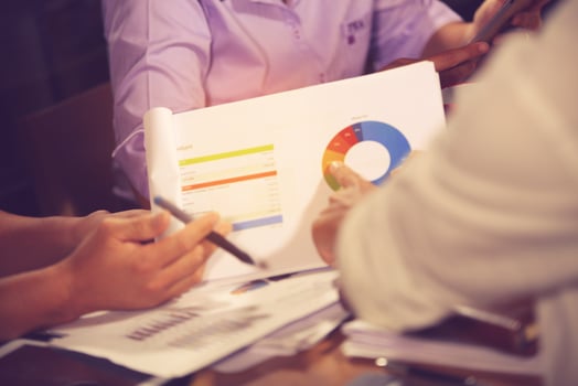 Financial advisor, accounting and Investment concept, business owners consult adviser financial meeting to analyze and on the finance report in the his office room.vintage color photo