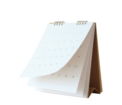 White paper desk calendar flipping page mockup isolated on white background photo