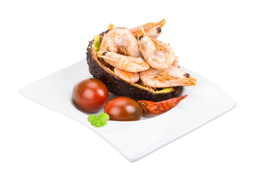 Shrimps in avocado in the bowl photo