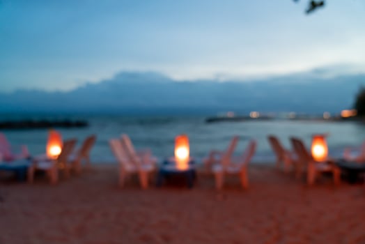 abstract blur restaurant on beach at night photo