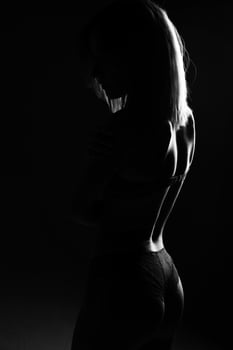 Female silhouette in lingerie black and white photo