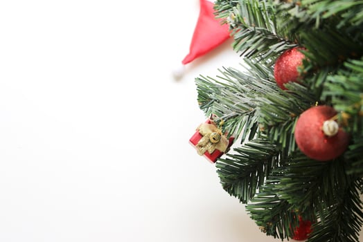 christmas tree with decorations ball and box gift on white background.selective focus at box photo