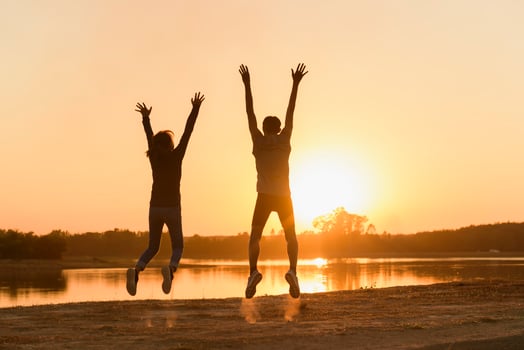 Romantice couple enjoying the sunset and enjoying life. photo