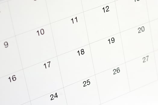 Dates on calendar page background,Closeup of numbers on calendar page photo