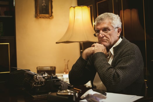 Pensive Retro Senior Man Writer photo