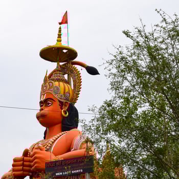 Big statue of Lord Hanuman near the delhi metro bridge situated near Karol Bagh, Delhi, India, Lord Hanuman big statue touching sky photo