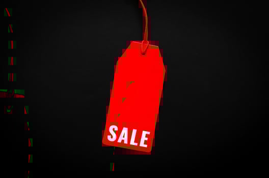 Red price tag with word for shopping and sale on Black Friday concept. photo